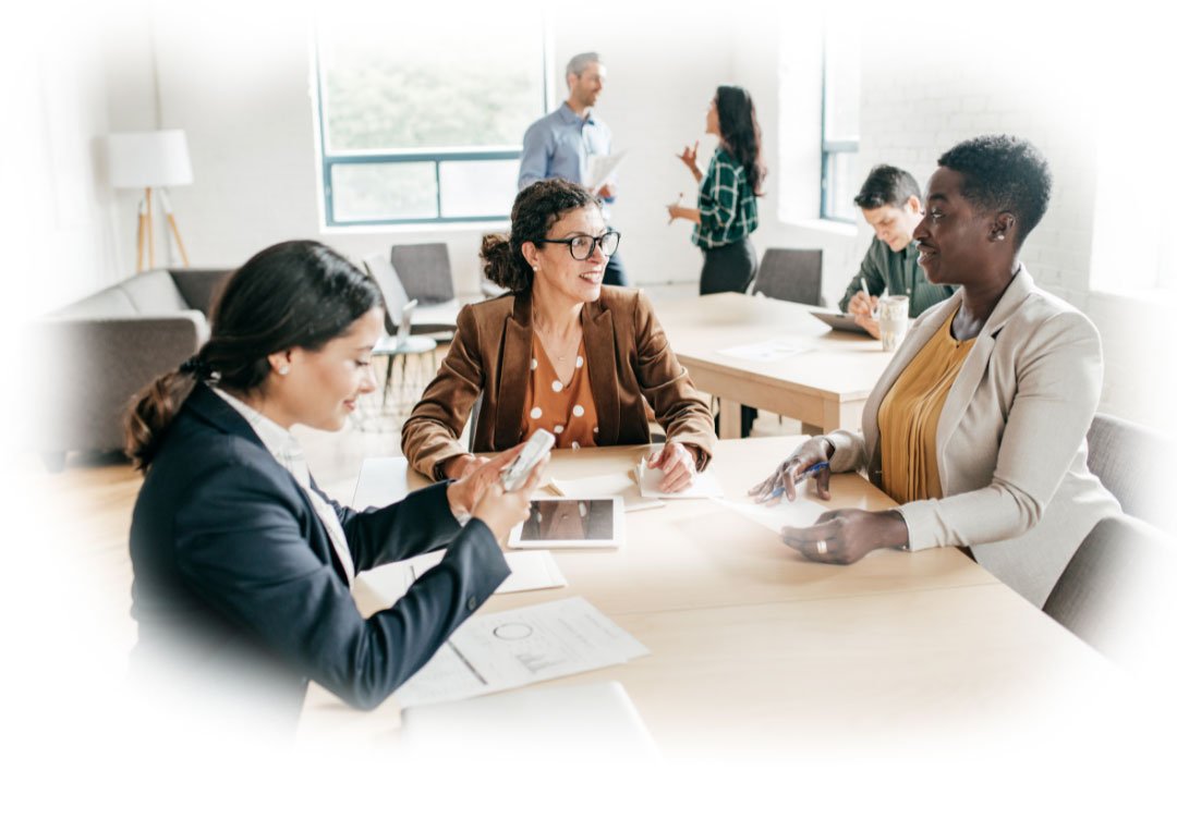 small-busines-taxes2 group of people in a room working and talking